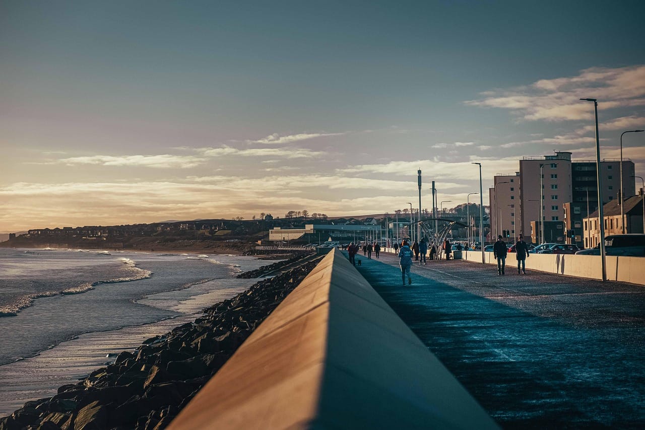 The sea wall, where several thousand people stood to watch.