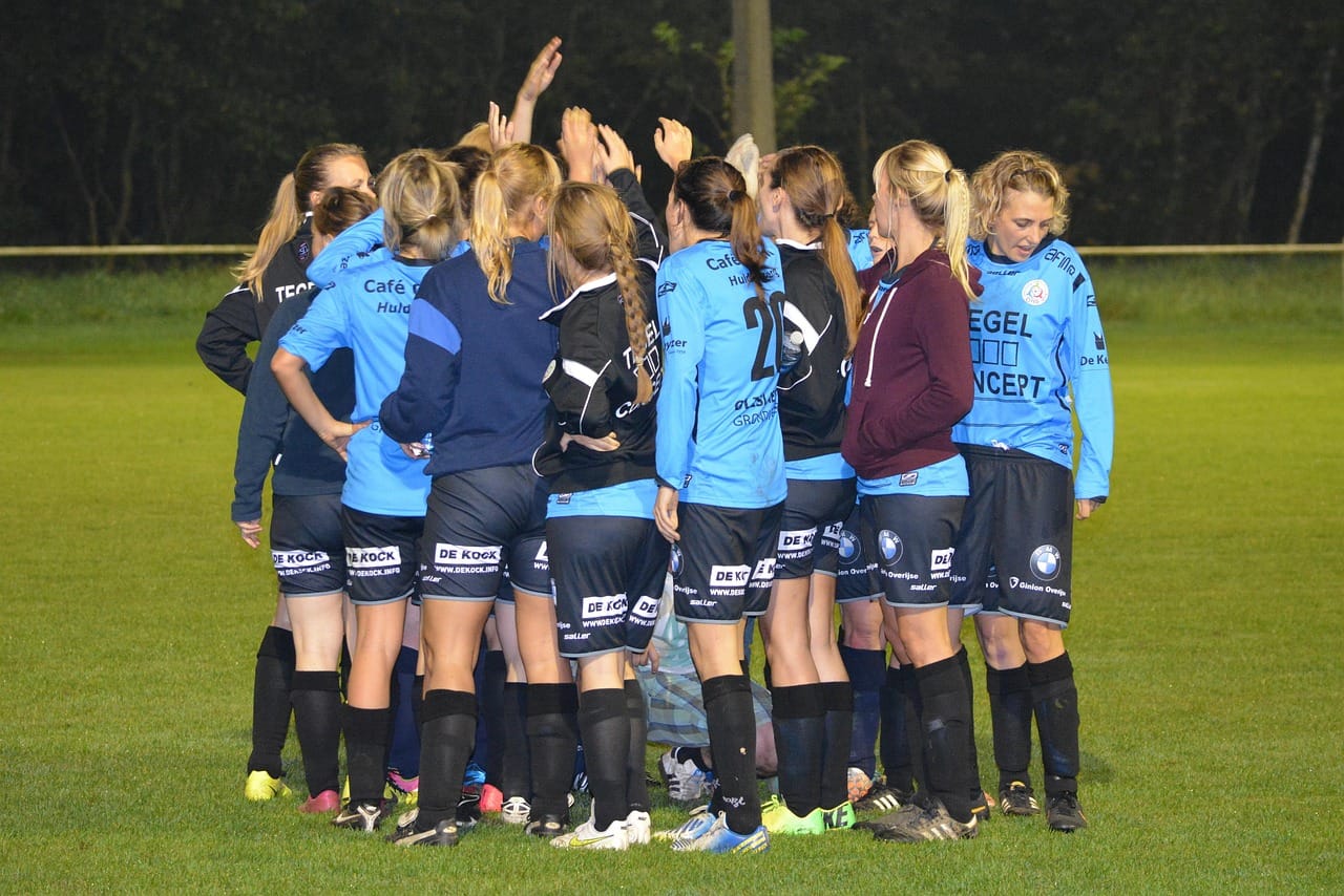 The Saltmarsh huddle before the shoot-out. Twenty minutes later, the celebration began.